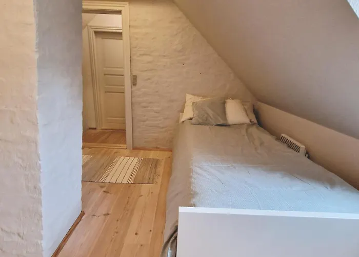 Charmerende I Den Gamle Kirkesmedje *